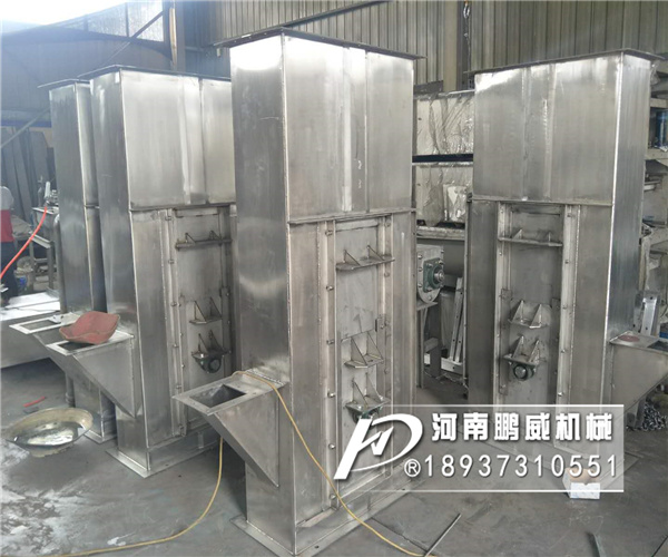 粘性物料斗式提升机料斗沾料有什么办法可以解决？